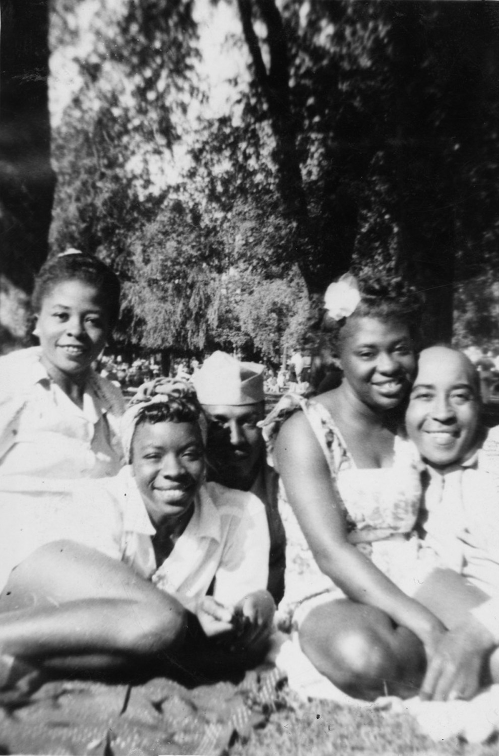 Miss Lewis (third from left) and friends Mill, Ben, Cynthia, and Freddie at Salem Willows Park, July 1944. Image courtesy of Northeastern University Archives & Special Collections.